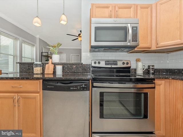 kitchen with appliances with stainless steel finishes and light brown cabinetry