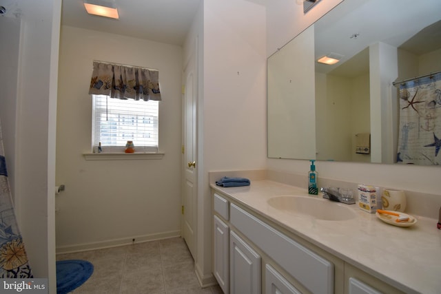 bathroom featuring vanity and tile patterned flooring