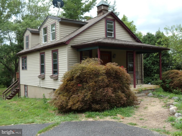 view of home's exterior featuring covered porch