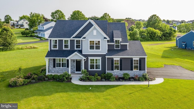 view of front of property with a front lawn