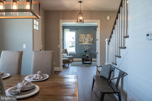 dining room featuring dark hardwood / wood-style flooring