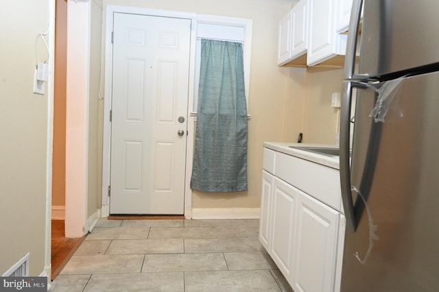 interior space with light tile patterned floors