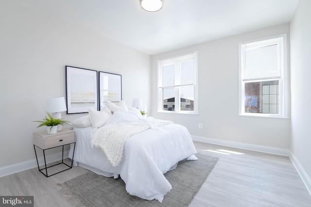 bedroom featuring light hardwood / wood-style floors