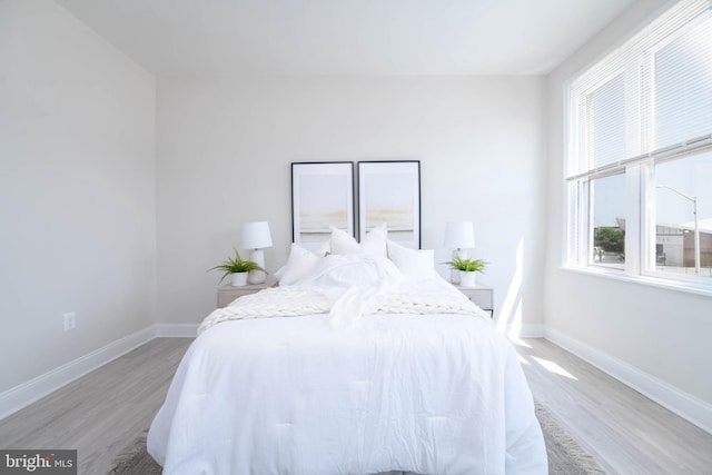 bedroom featuring hardwood / wood-style floors