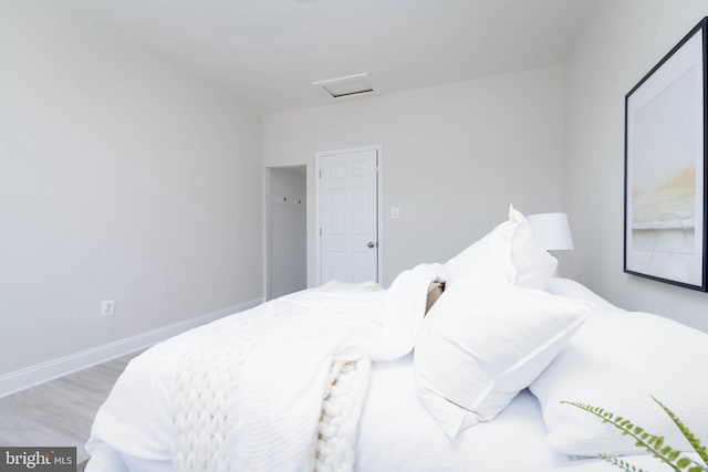 bedroom featuring light wood-type flooring