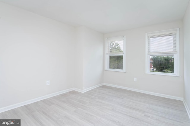 empty room featuring light hardwood / wood-style floors