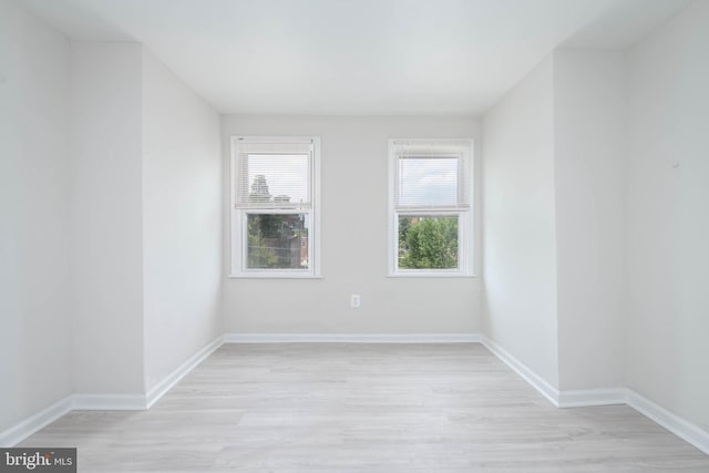 empty room with light wood-type flooring