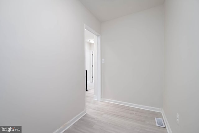 hallway featuring light hardwood / wood-style flooring