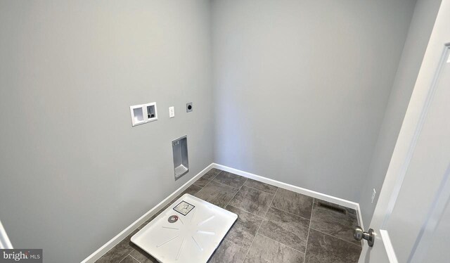 bathroom featuring dual vanity and a wealth of natural light