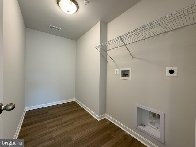 laundry room with washer hookup, dark hardwood / wood-style floors, and electric dryer hookup