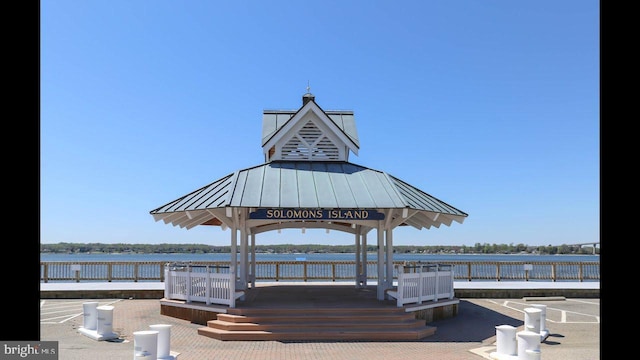 view of home's community featuring a gazebo and a water view