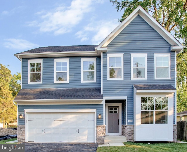 view of front of house with a garage