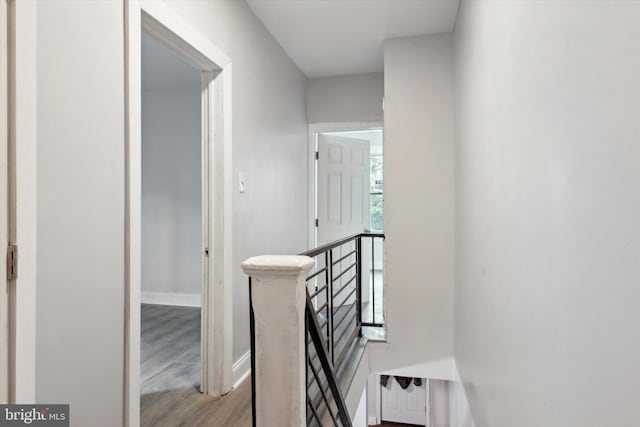 hallway with light wood-type flooring