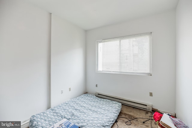 bedroom featuring baseboard heating