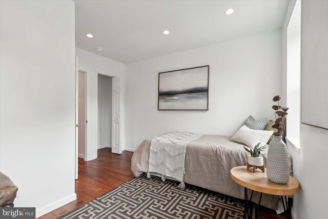 bedroom featuring hardwood / wood-style floors