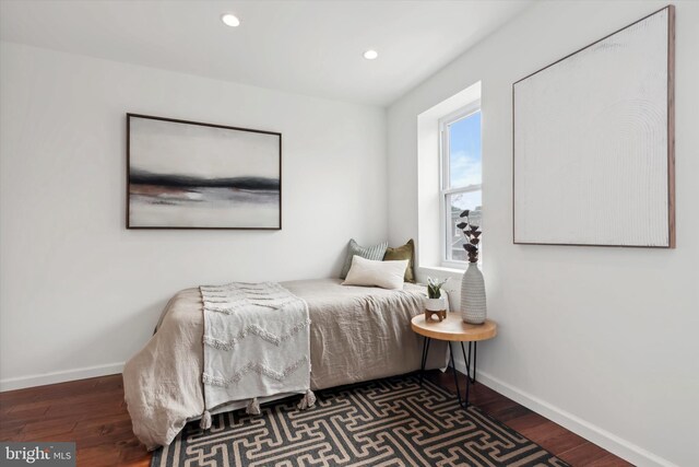 bedroom featuring wood-type flooring