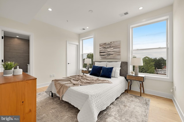 bedroom featuring light wood-type flooring