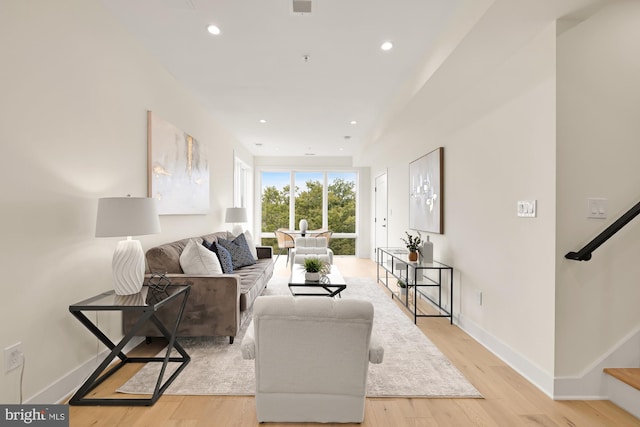 living room with light hardwood / wood-style floors