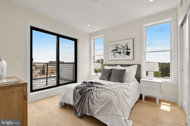 bedroom with light hardwood / wood-style flooring