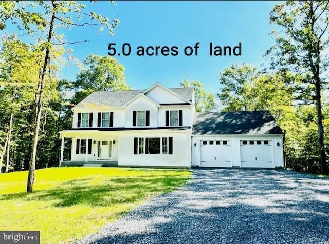 view of front facade featuring a garage and a front lawn