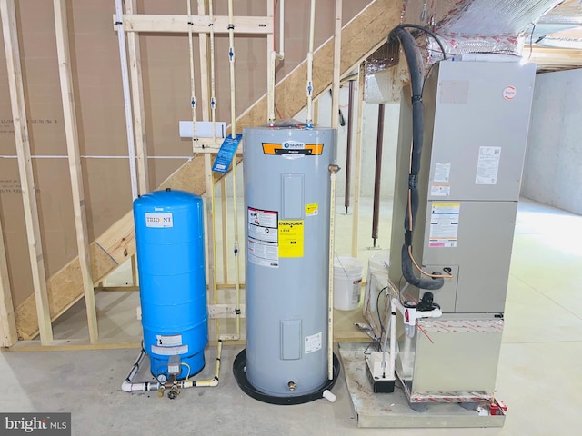 utility room featuring electric water heater