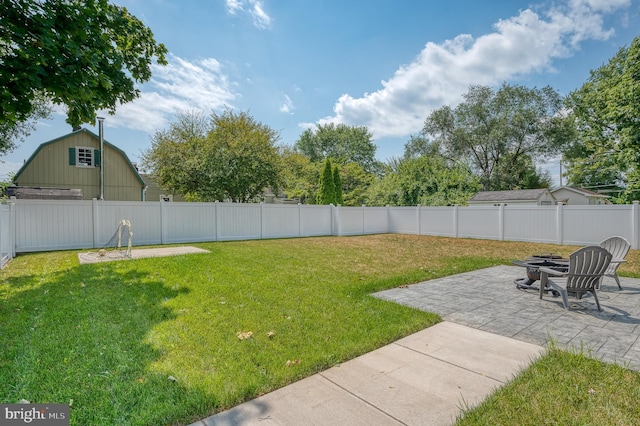 view of yard with a fenced backyard and a patio