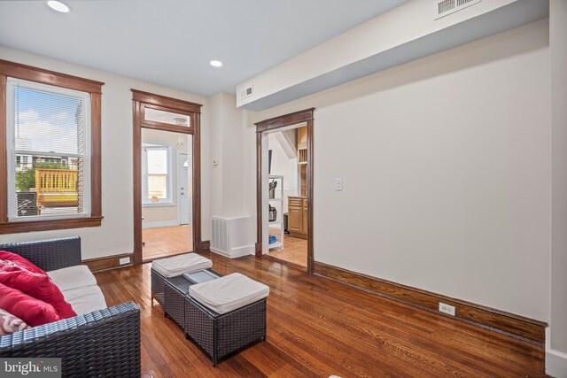 living room featuring dark hardwood / wood-style floors