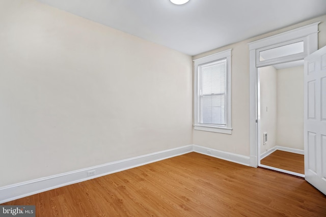 unfurnished bedroom featuring wood-type flooring