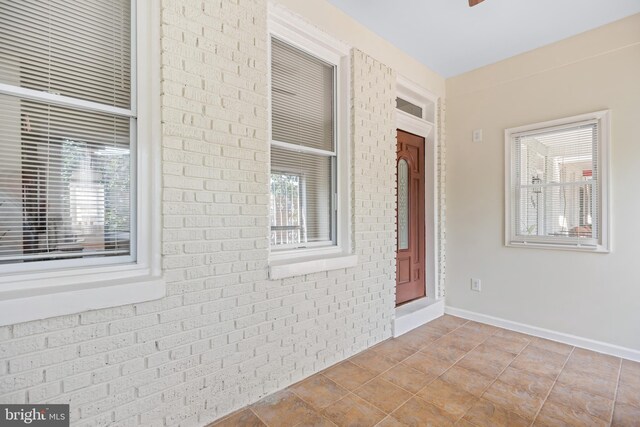 interior space with brick wall