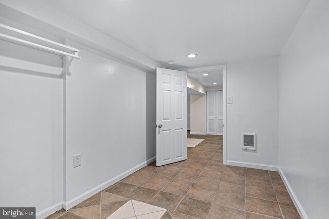 basement with tile patterned flooring