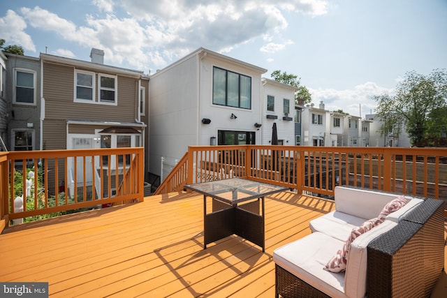 deck featuring an outdoor living space