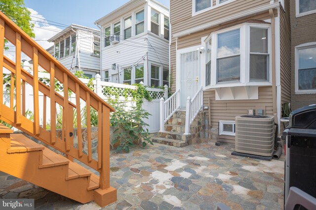 view of patio with central AC