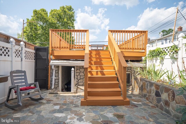 view of patio with a wooden deck