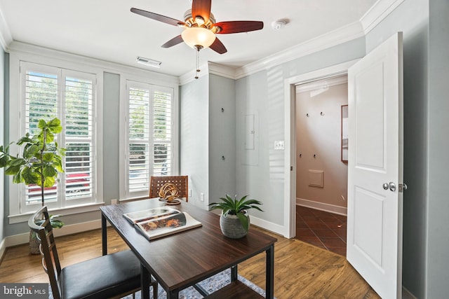 interior space featuring crown molding and ceiling fan