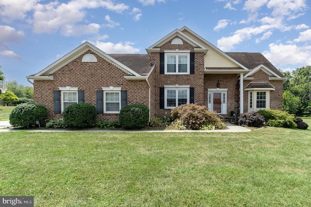 view of front property with a front lawn