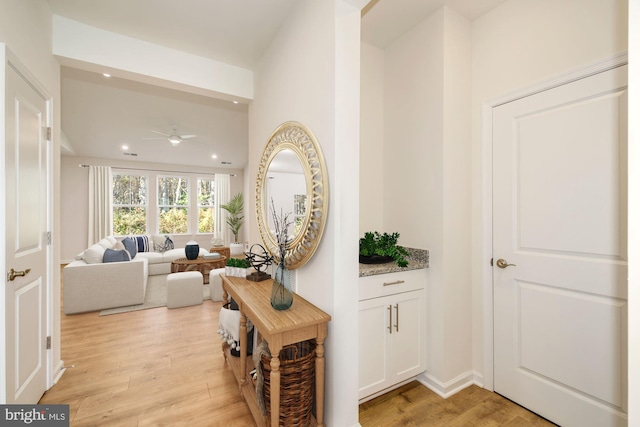 hall featuring light hardwood / wood-style floors