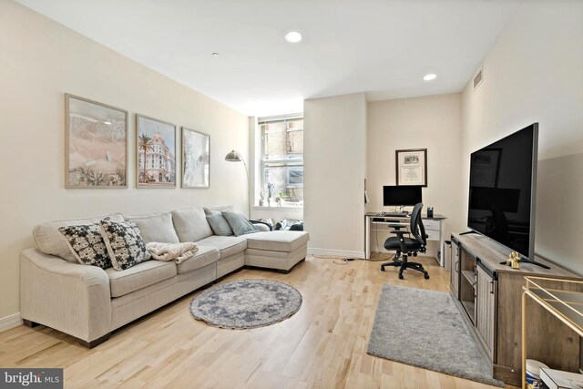 living room with hardwood / wood-style floors