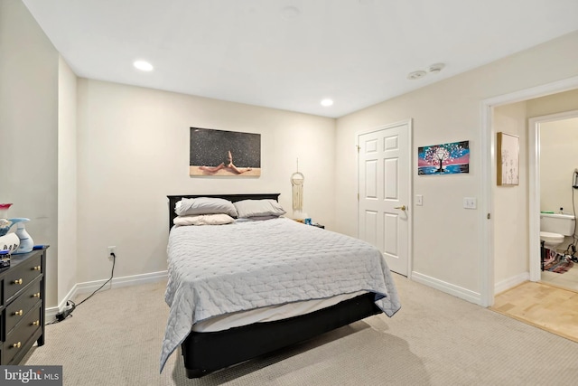 bedroom with light carpet