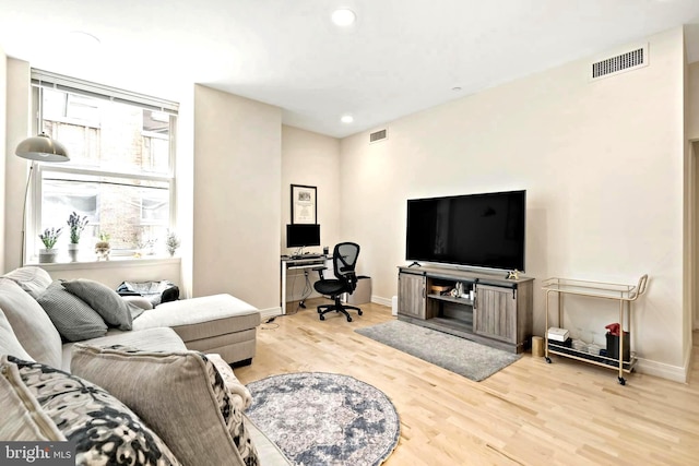 living room featuring light wood-type flooring