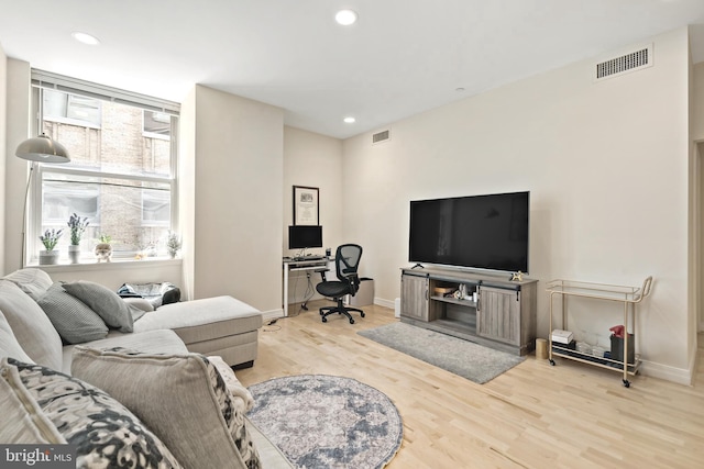 living room featuring light hardwood / wood-style flooring