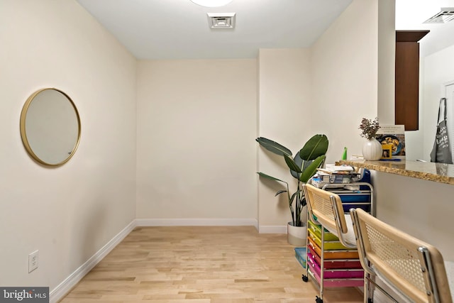 office space featuring light hardwood / wood-style floors