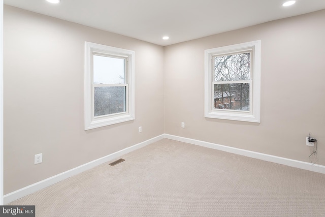 view of carpeted spare room