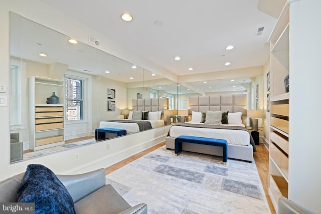 bedroom with light hardwood / wood-style flooring