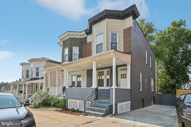 view of front facade featuring covered porch