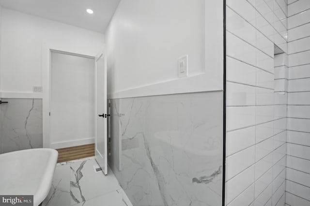 bathroom featuring a bathing tub