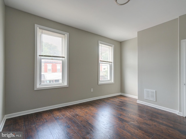 empty room featuring hardwood / wood-style floors