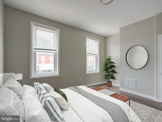 bedroom featuring wood-type flooring