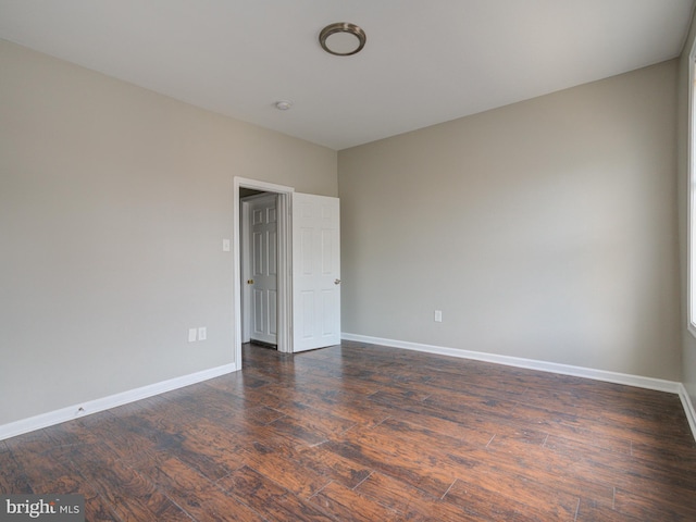 spare room featuring hardwood / wood-style flooring