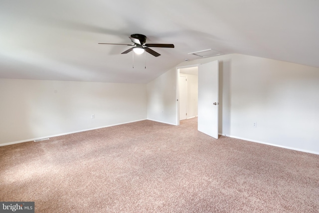 bonus room featuring lofted ceiling, carpet, and ceiling fan