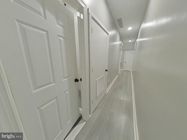 hallway featuring light wood-type flooring